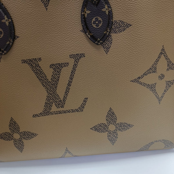 ONTHEGO MM Monogram Coated Canvas Brown