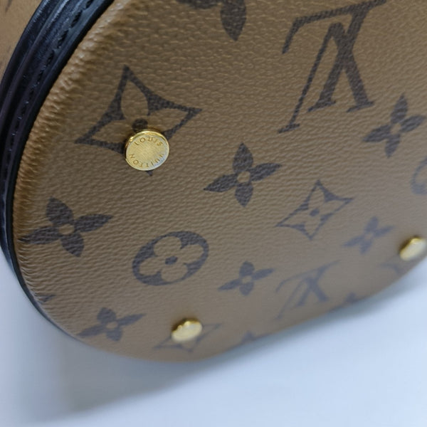 CANNES PM Monogram Coated Canvas Brown