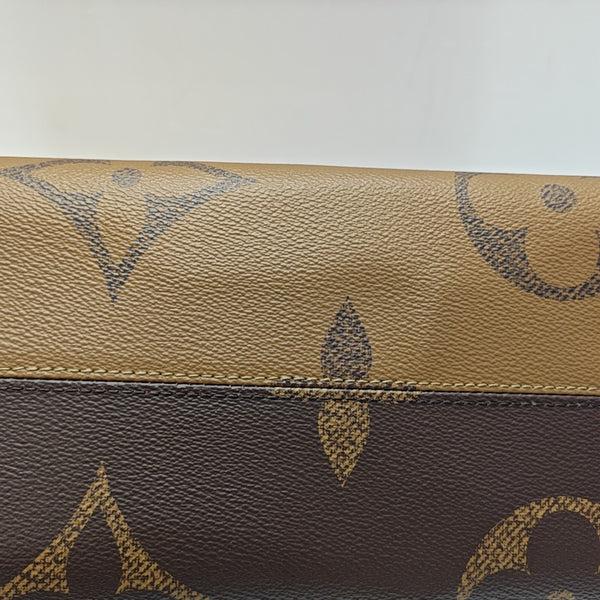 ONTHEGO MM Monogram Coated Canvas Brown