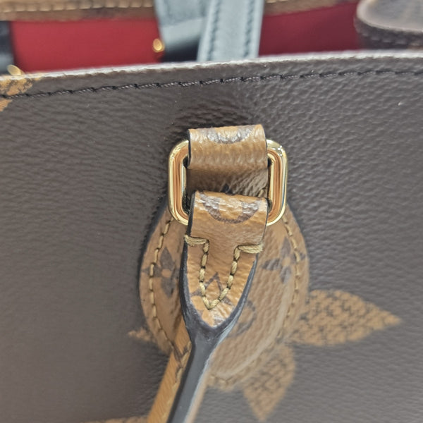 ONTHEGO MM Monogram Coated Canvas Brown