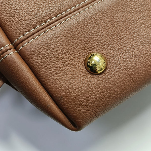 LOW KEY HOBO PM Monogram Calfskin Brown