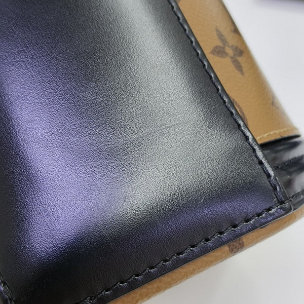 CANNES PM Monogram Coated Canvas Brown