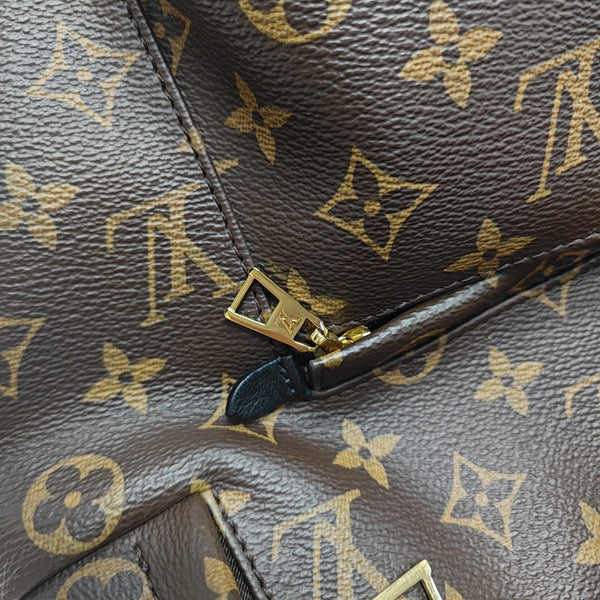 Monogram Coated Canvas Backpack Brown