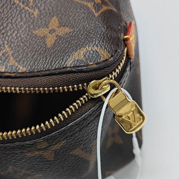 Monogram Coated Canvas Clutch Brown