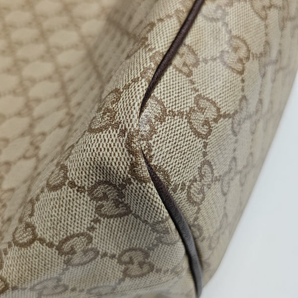 Tribeca Large Monogram Coated Canvas Beige