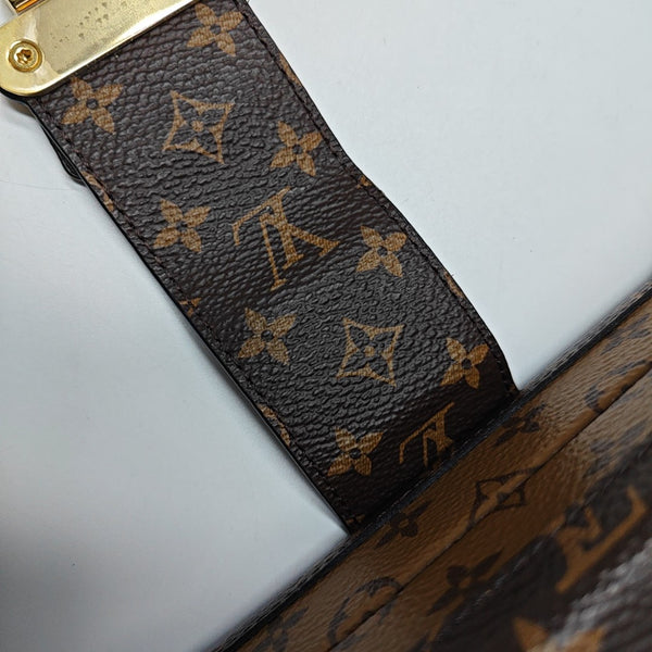 PETITE MALLE Monogram Coated Canvas Brown