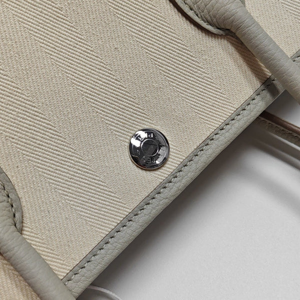 Authenticated pre-owned Garden Party Canvas White - Top Handle Bag at Looply