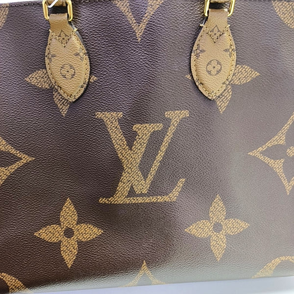 ONTHEGO MM Monogram Coated Canvas Brown