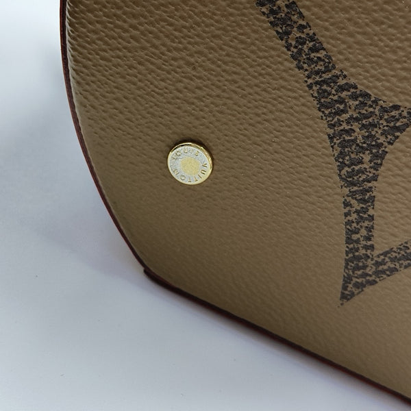 CANNES Monogram Coated Canvas Brown