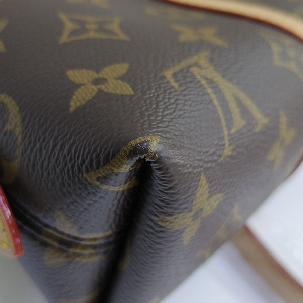 SQUIRE EAST WEST Monogram Coated Canvas Brown