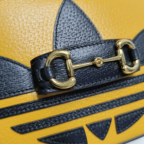 Authenticated pre-owned Horsebit 1955 Mini Calfskin Yellow - Shoulder Bag at Looply