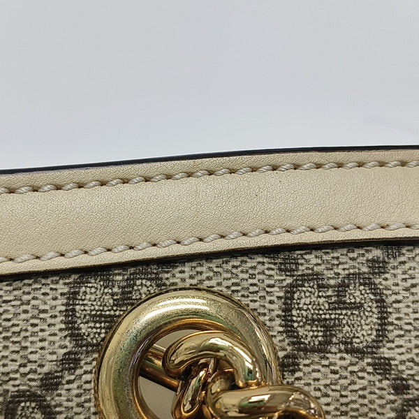Padlock Small Monogram Coated Canvas Beige