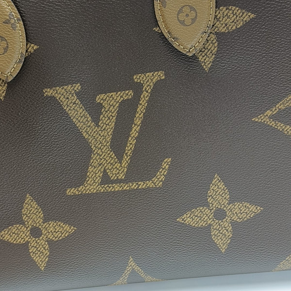 ONTHEGO MM Monogram Coated Canvas Brown