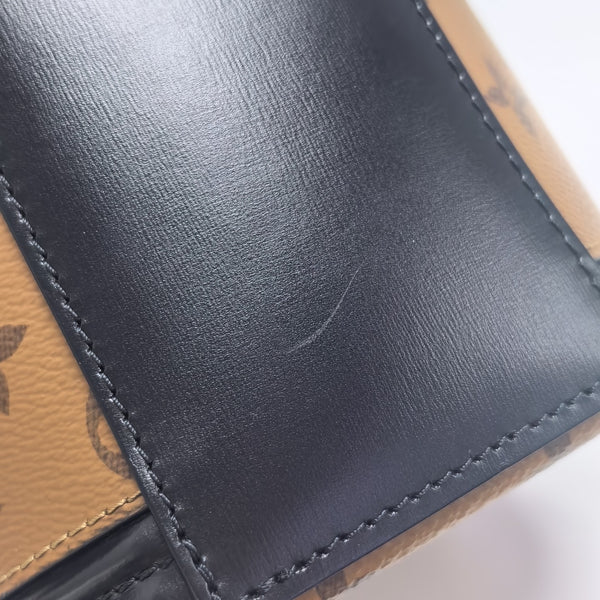 CANNES PM Monogram Coated Canvas Brown