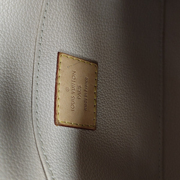 COSMETIC Monogram Coated Canvas Brown