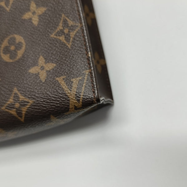 TOILET POCKET 19 Monogram Coated Canvas Brown