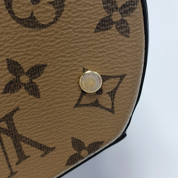 CANNES PM Monogram Coated Canvas Brown