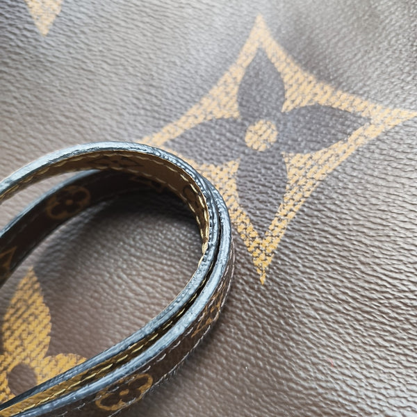 ONTHEGO GM Monogram Coated Canvas Brown