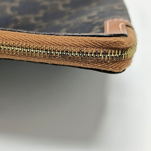 Authenticated pre-owned TRIOMPHE Small Coated Canvas Brown - Clutch at Looply