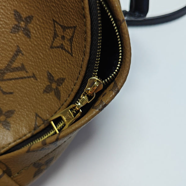 PALM SPRINGS Mini Monogram Coated Canvas Brown