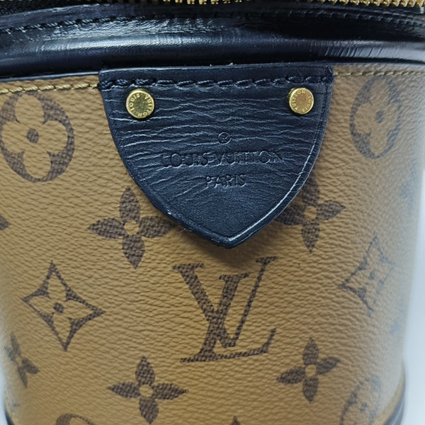 CANNES PM Monogram Coated Canvas Brown
