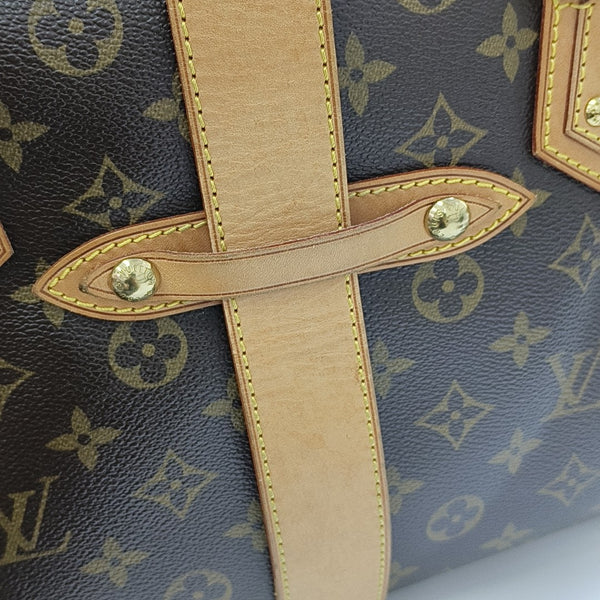 MANHATTAN GM Monogram Coated Canvas Brown