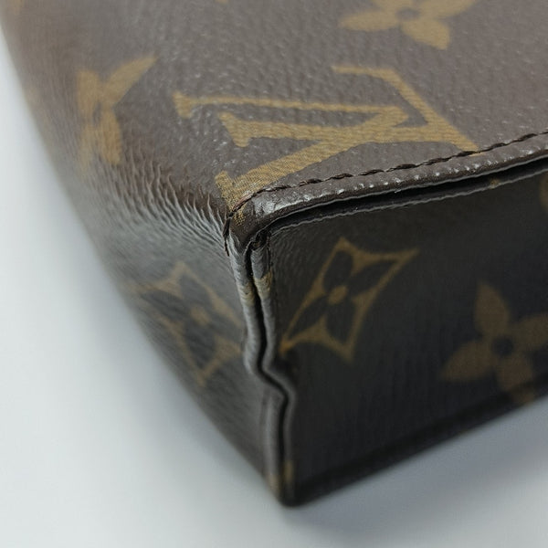 TOILET POCKET 19 Monogram Coated Canvas Brown