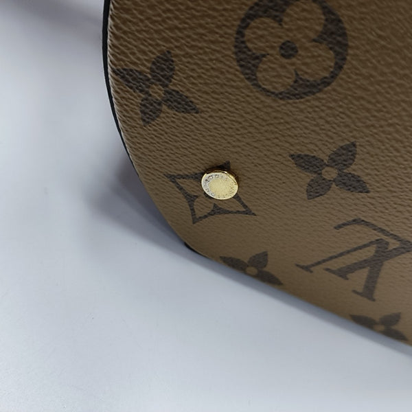 CANNES PM Monogram Coated Canvas Brown