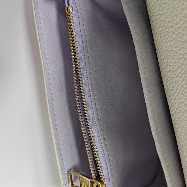 MÉTIS EAST WEST Monogram Calfskin White