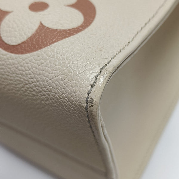 ONTHEGO MM Monogram Calfskin Beige