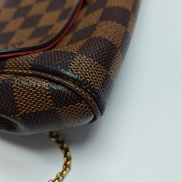 FAVORITE PM Damier Ebene Coated Canvas Brown
