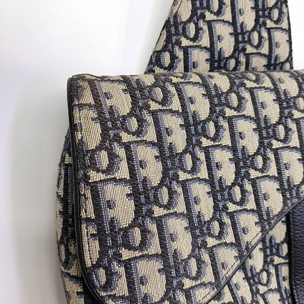 Authenticated pre-owned Saddle Medium Monogram Canvas Beige - Crossbody Bag at Looply