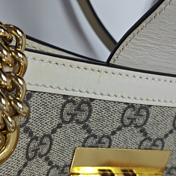 Padlock Small Monogram Coated Canvas Beige