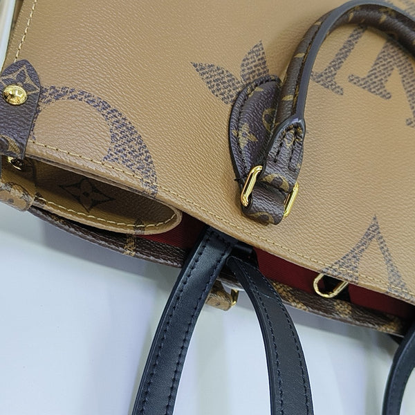 ONTHEGO MM Monogram Coated Canvas Brown