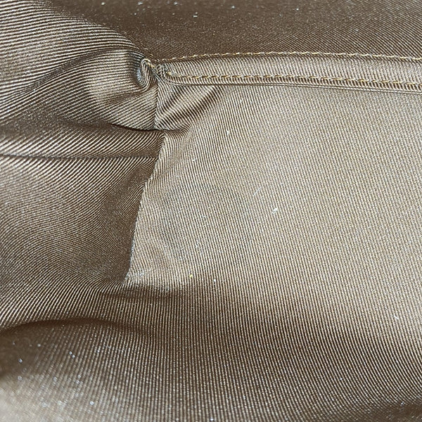 SOFT TRUNK Monogram Coated Canvas Brown
