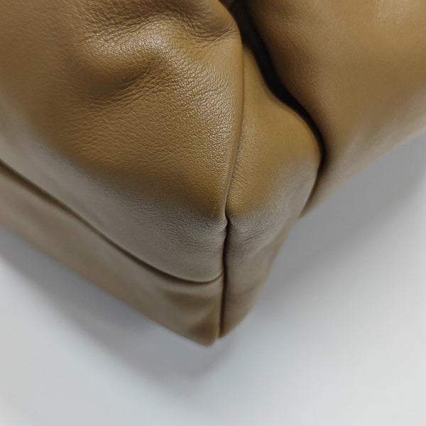 Authenticated pre-owned The Pouch Calfskin Brown - Top Handle Bag at Looply