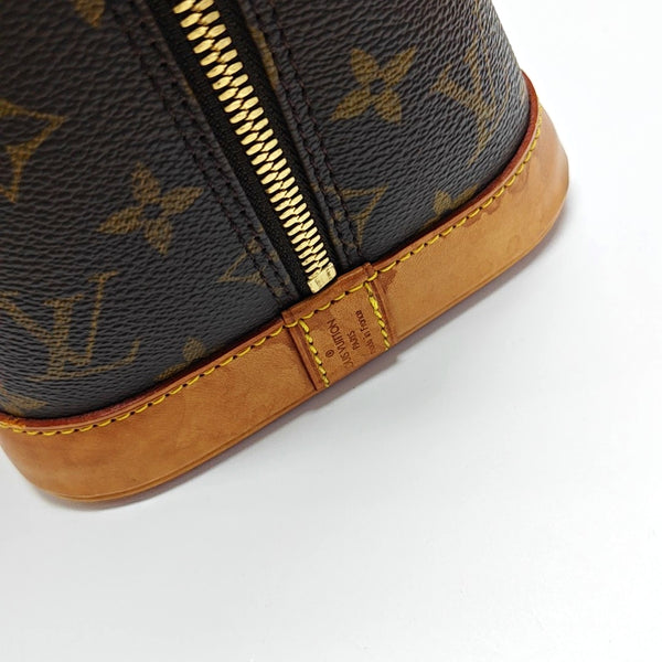 ALMA PM Monogram Coated Canvas Brown