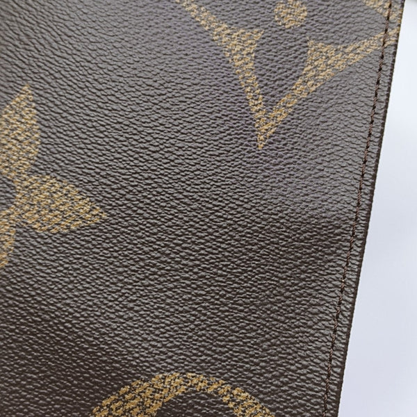 ONTHEGO MM Monogram Coated Canvas Brown