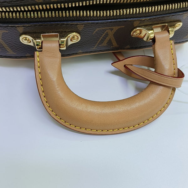 LUGGAGE Monogram Coated Canvas Brown