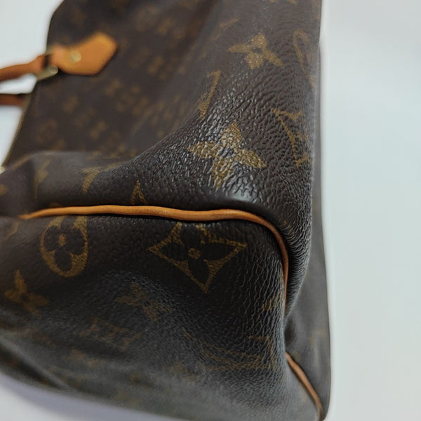 SPEEDY 30 Monogram Coated Canvas Brown