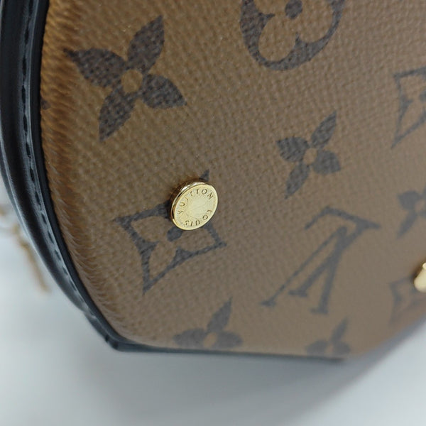 CANNES PM Monogram Coated Canvas Brown
