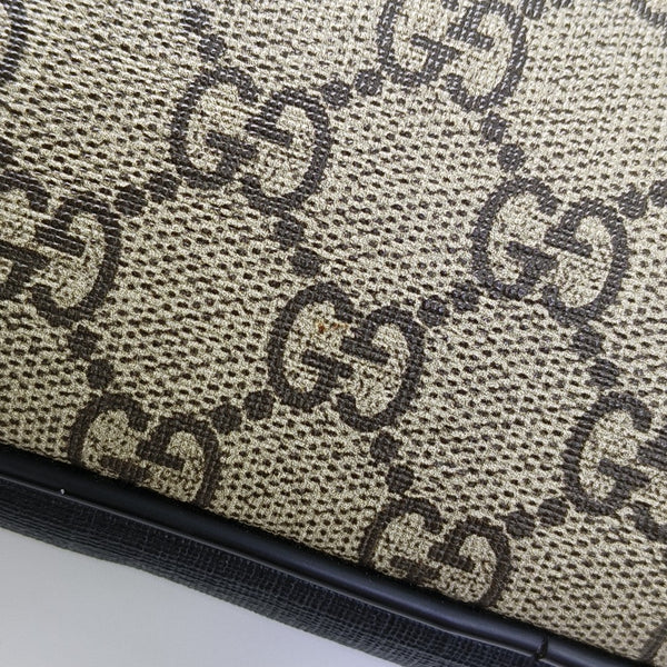 Authenticated pre-owned GG Marmont Monogram Coated Canvas Beige - Clutch at Looply
