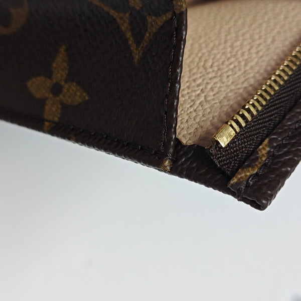 TOILET POCKET Monogram Coated Canvas Brown