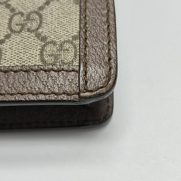 Authenticated pre-owned Ophidia Monogram Coated Canvas Beige - Clutch at Looply