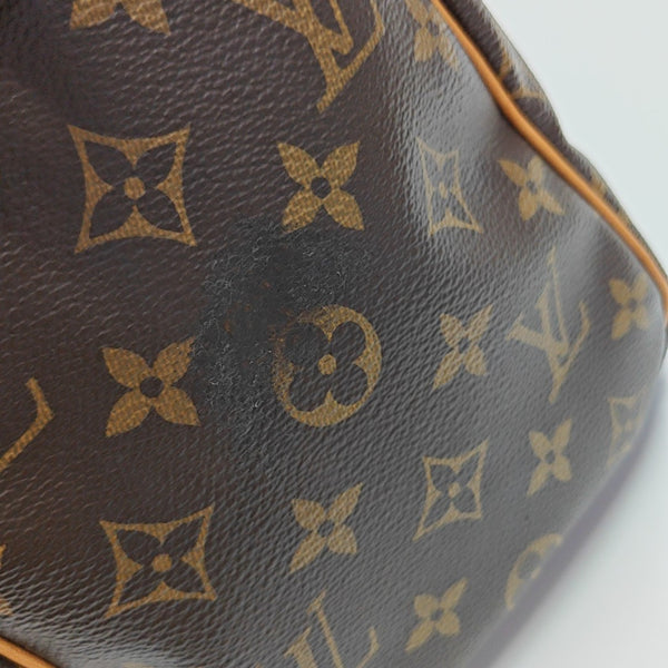 SPEEDY 25 Monogram Coated Canvas Brown