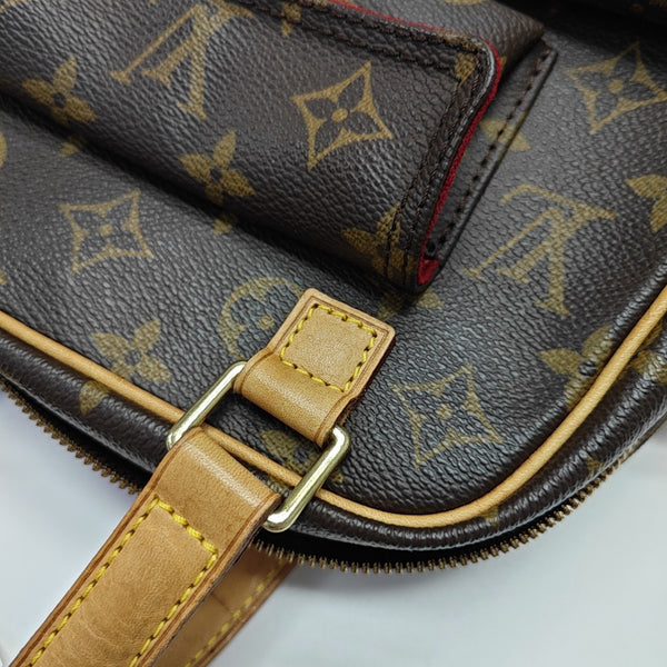 EXCENTRI-CITE Monogram Coated Canvas Brown