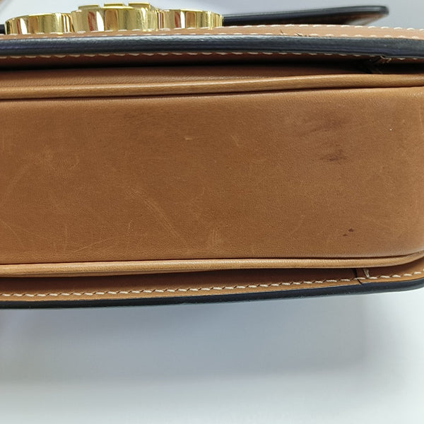 TRIOMPHE Small Coated Canvas Brown