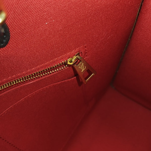 ONTHEGO MM Monogram Coated Canvas Brown