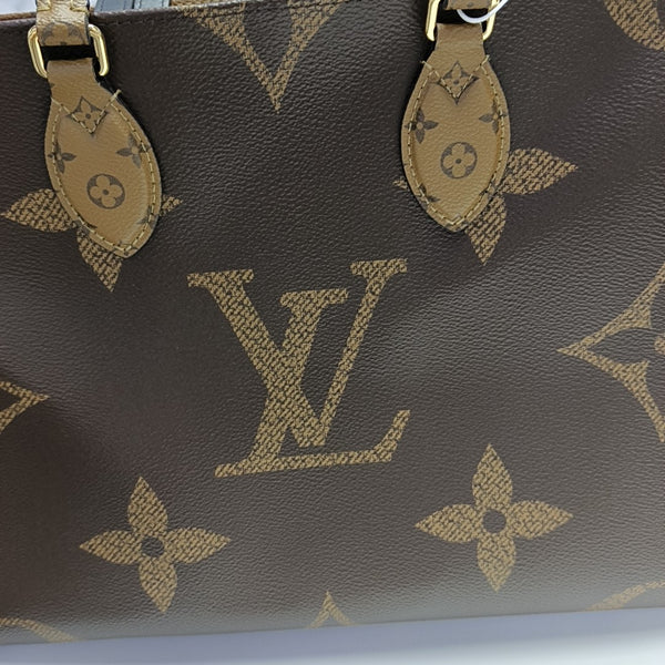 ONTHEGO MM Monogram Coated Canvas Brown