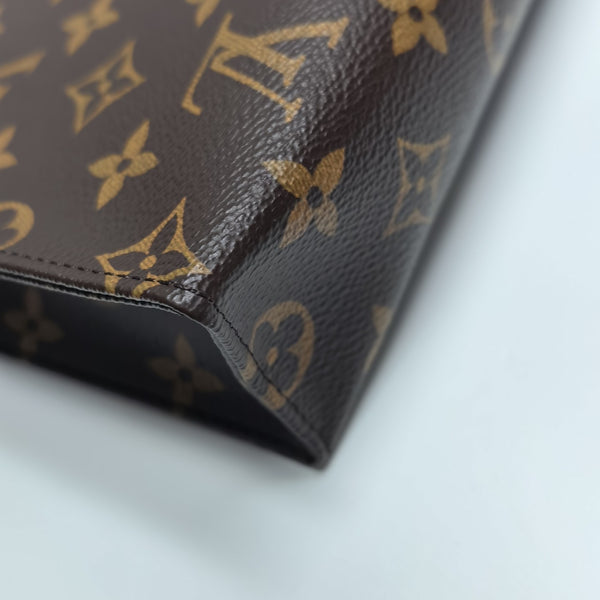 TOILET POCKET 26 Monogram Coated Canvas Brown